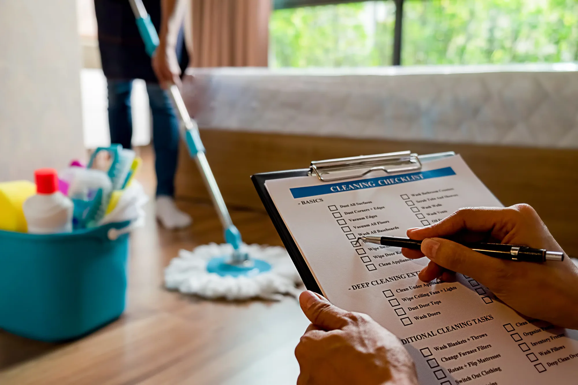 Person holding a clipboard to book a service